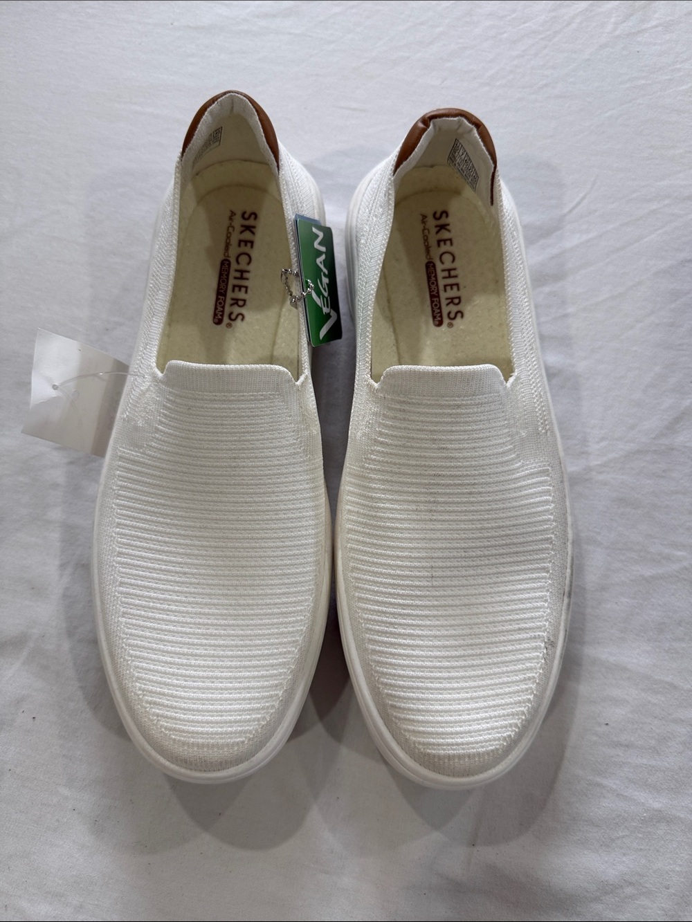 Skechers Women’s White Slip-On Knit Loafers with Brown Heel Tab